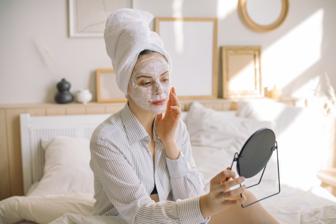 woman applying facial mask in bedroom 2026 03 17 06 43 36 utc
